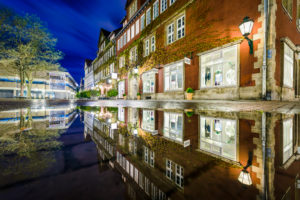 Reflection in a rain puddle in the old city of Hannover, Germany Reflection in a rain puddle in the old city of Hannover, Germany